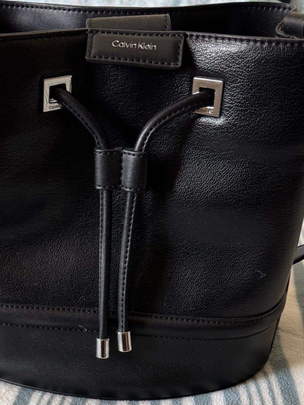 Calvin Klein Ash Drawstring Bucket Crossbody Bag in Black with Silver Hardware - Picture 11 of 13